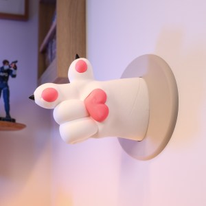 Kisuloppa – veggfestur heyrnartólahaldari